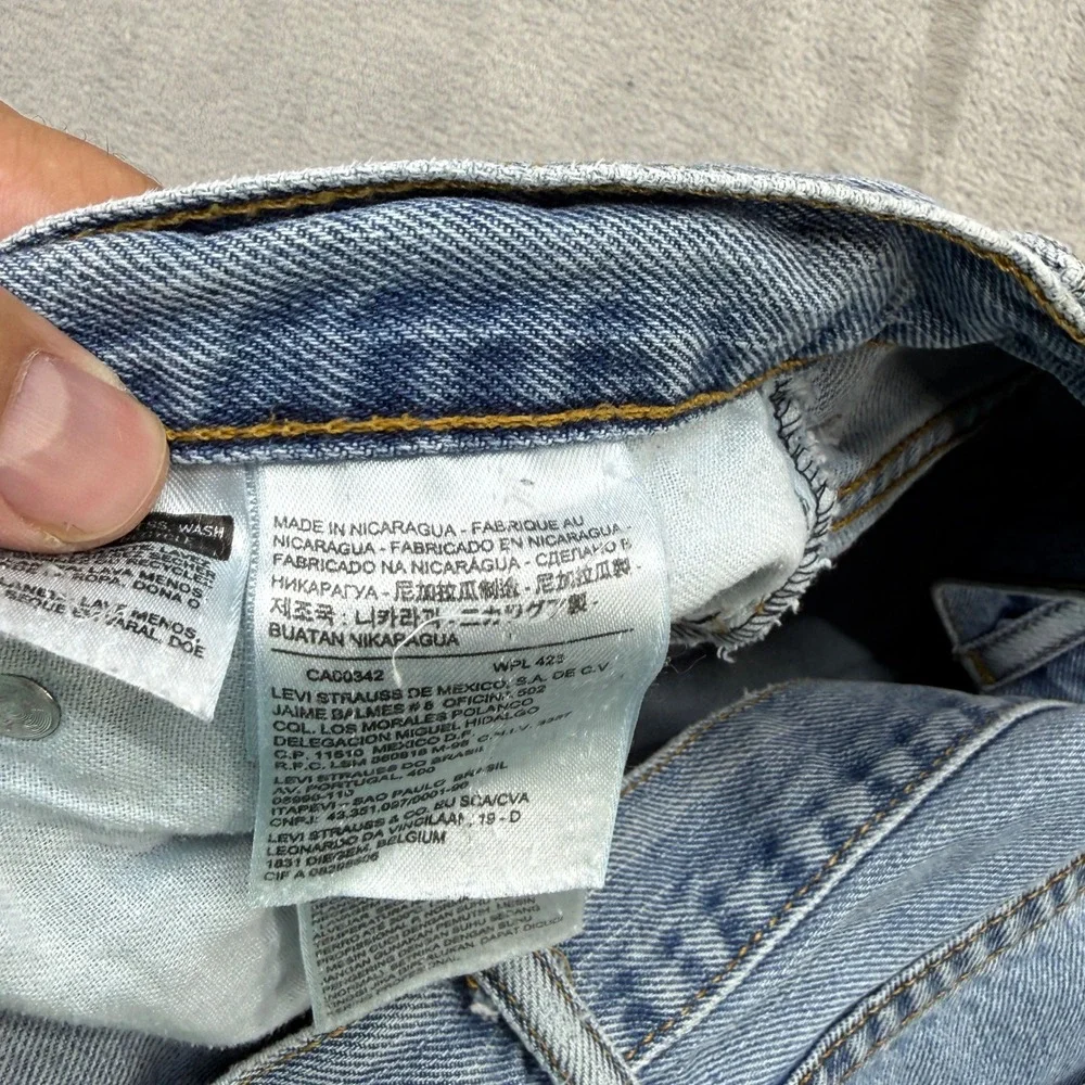 Levi's 550 Relaxed Fit Jeans Mens 36x34 Light Wash Blue Denim Tapered Leg Baggy